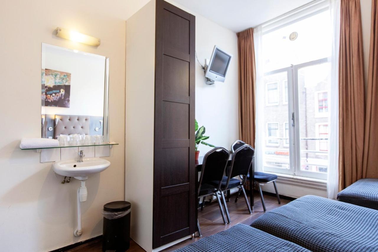 Vierpersoonskamer met Gedeelde Badkamer