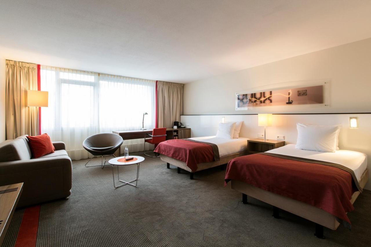 Suite met 2 aparte bedden en een slaapbank