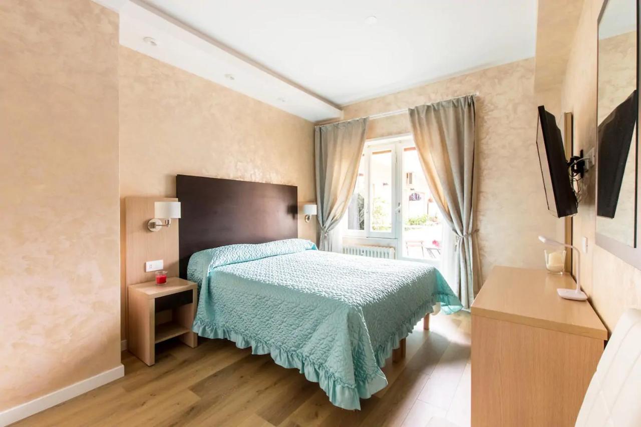 Kamer met Queensize Bed en Balkon
