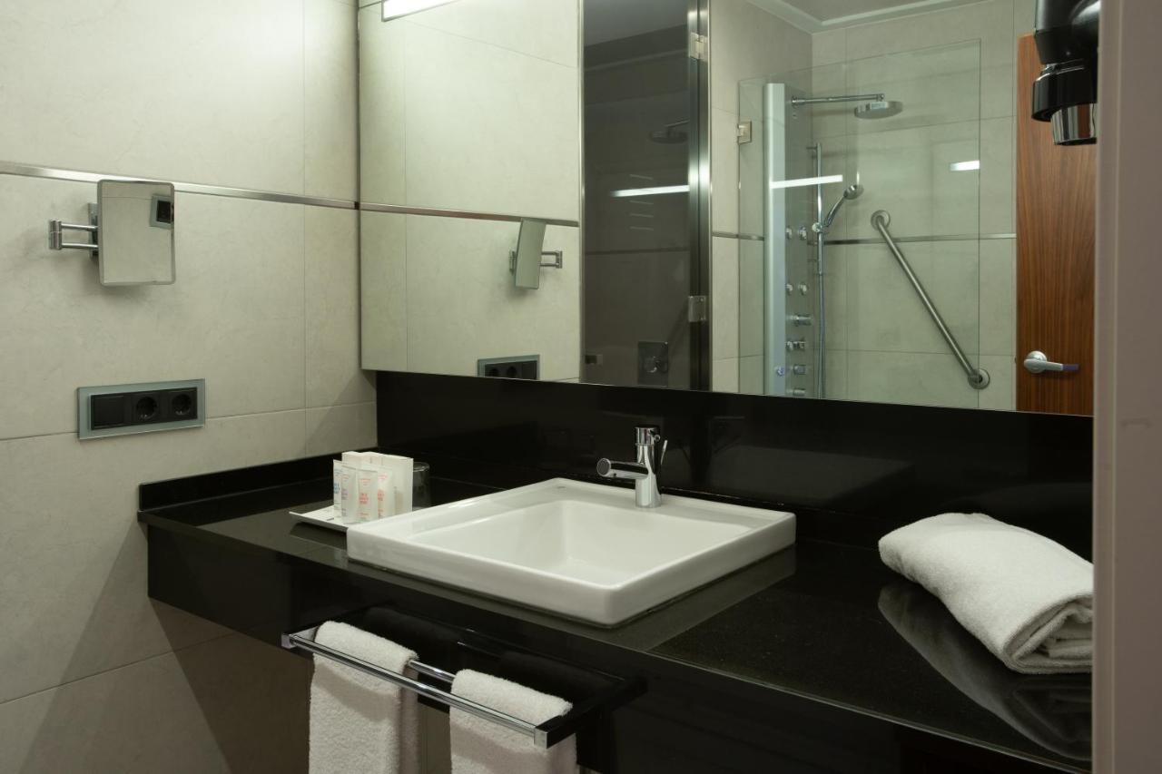 Tweepersoonskamer met 1 of 2 Bedden - Douche