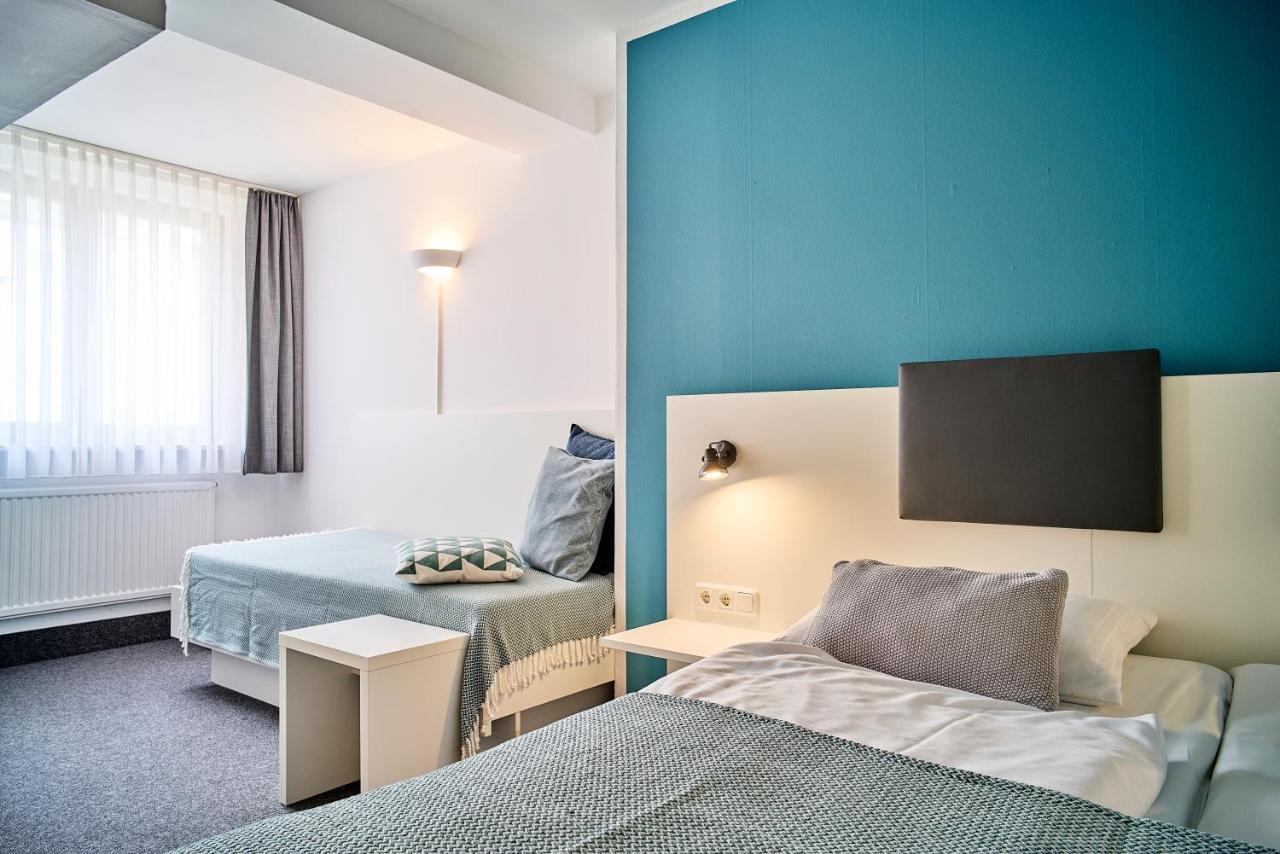 Kamer met 6 Bedden en Uitzicht op de Binnenplaats