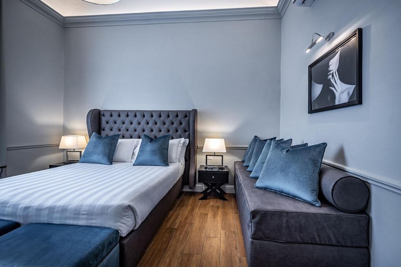 Kamer met Queensize Bed en Slaapbank