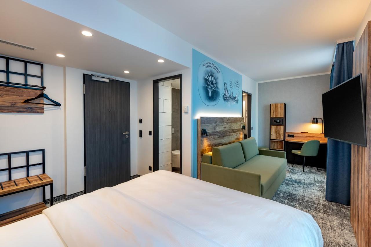 Moderne Familiekamer met 1 Tweepersoonsbed en 1 Slaapbank