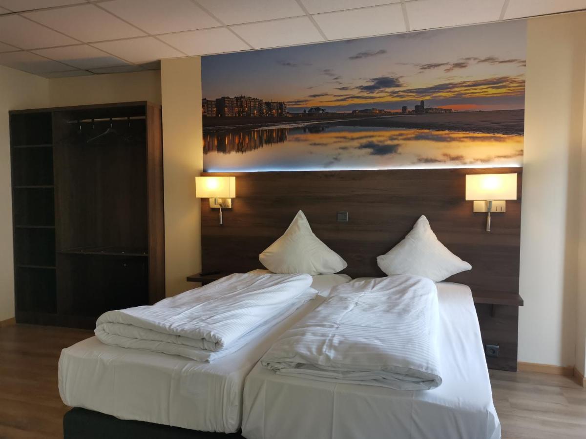 Comfort Tweepersoonskamer - 1 tweepersoonsbed of 2 aparte bedden met uitzicht op de stad