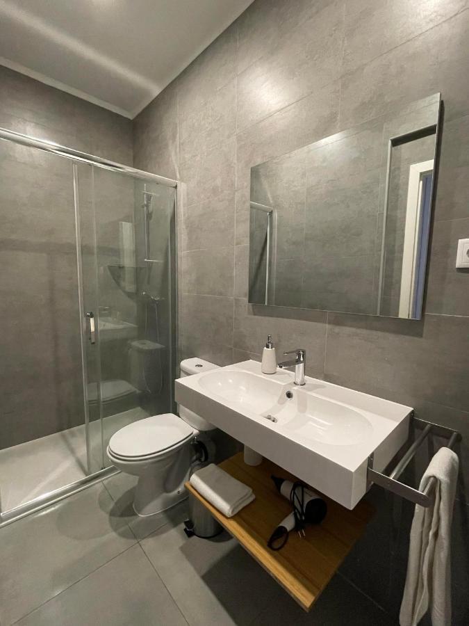 Tweepersoonskamer met 1 of 2 Bedden en Eigen Externe Badkamer