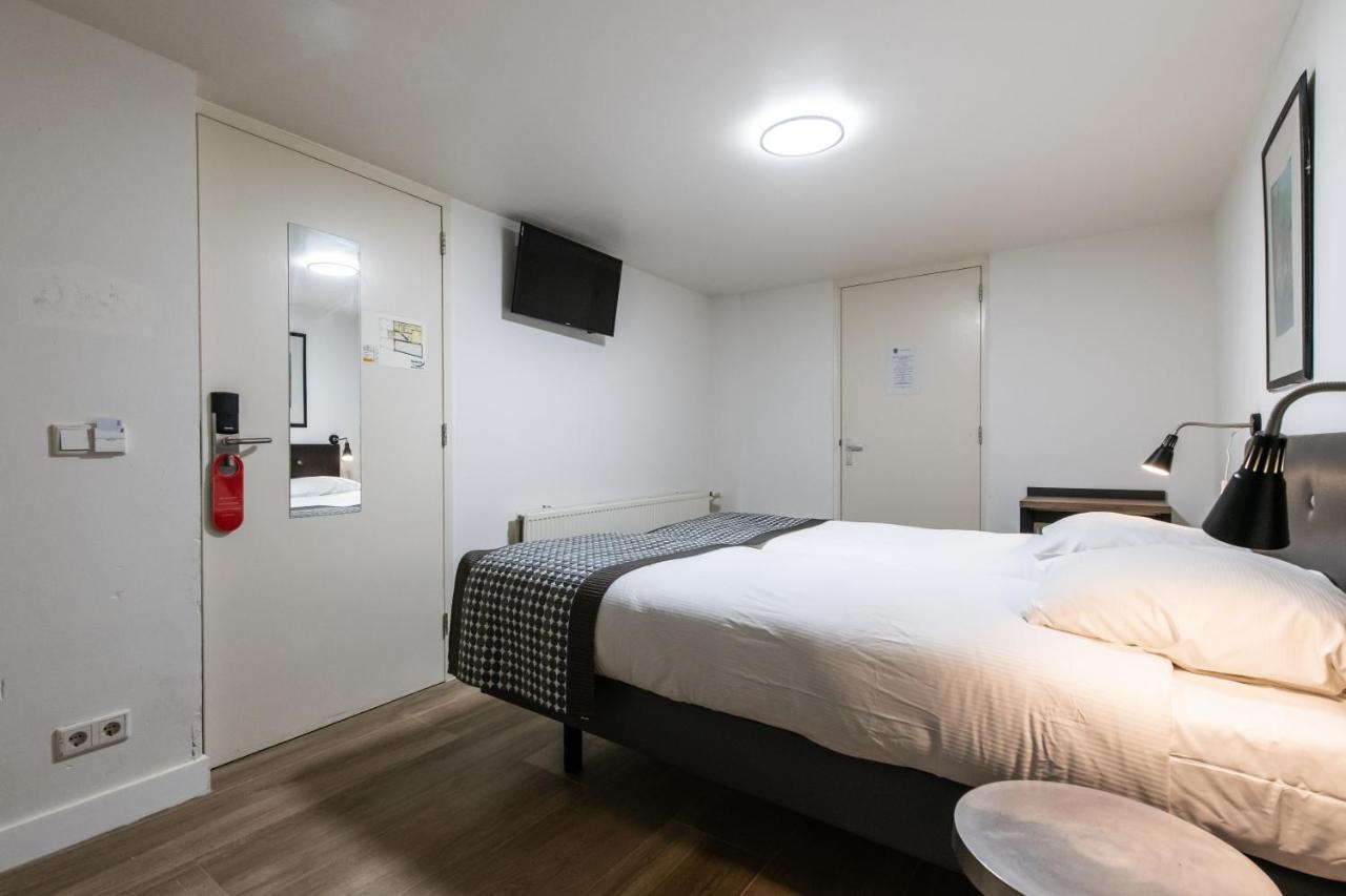 Souterrain Tweepersoonskamer met 2 Aparte Bedden