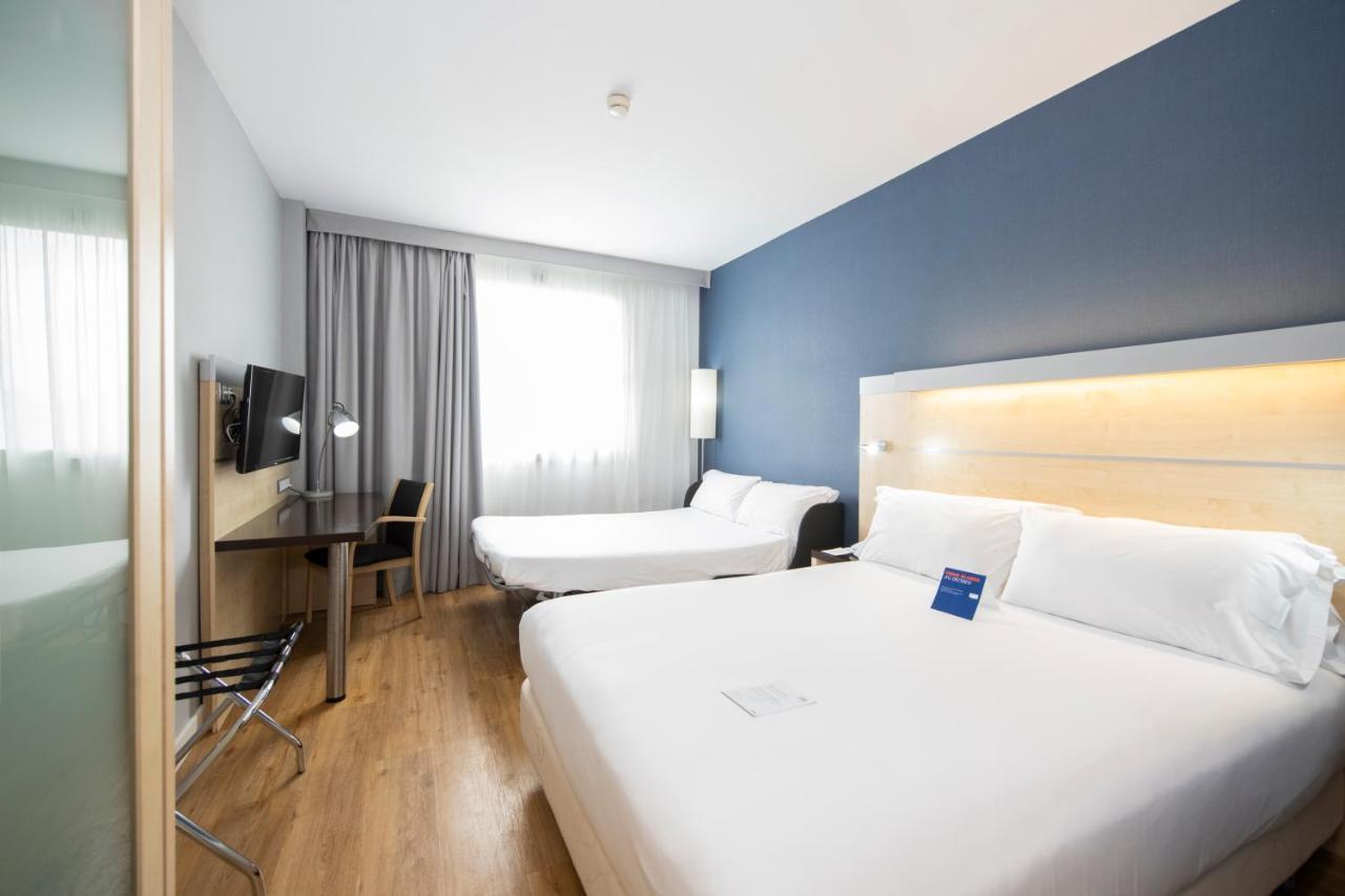 Standaard Kamer met Queensize Bed en Slaapbank