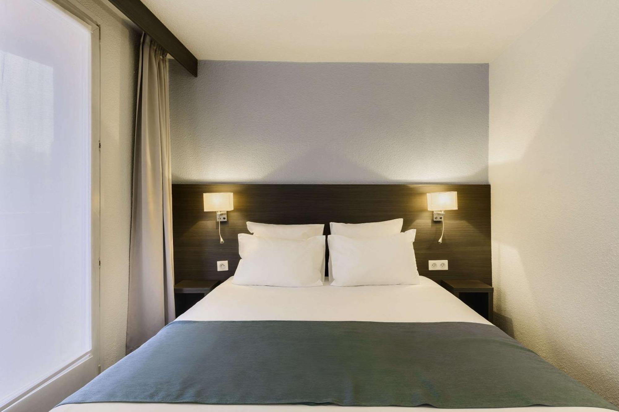 1 Tweepersoonsbed en 2 Eenpersoonsbedden