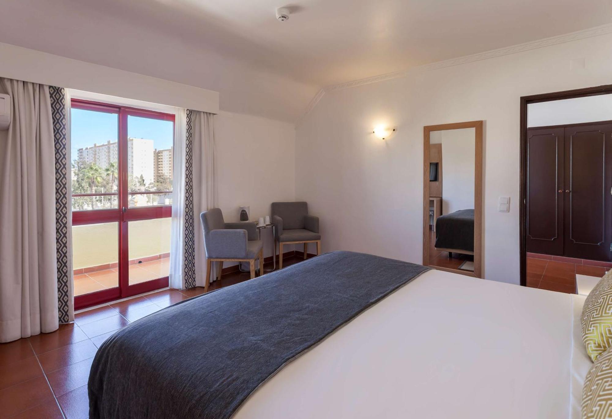 Suite Double Single Beds Balcony
