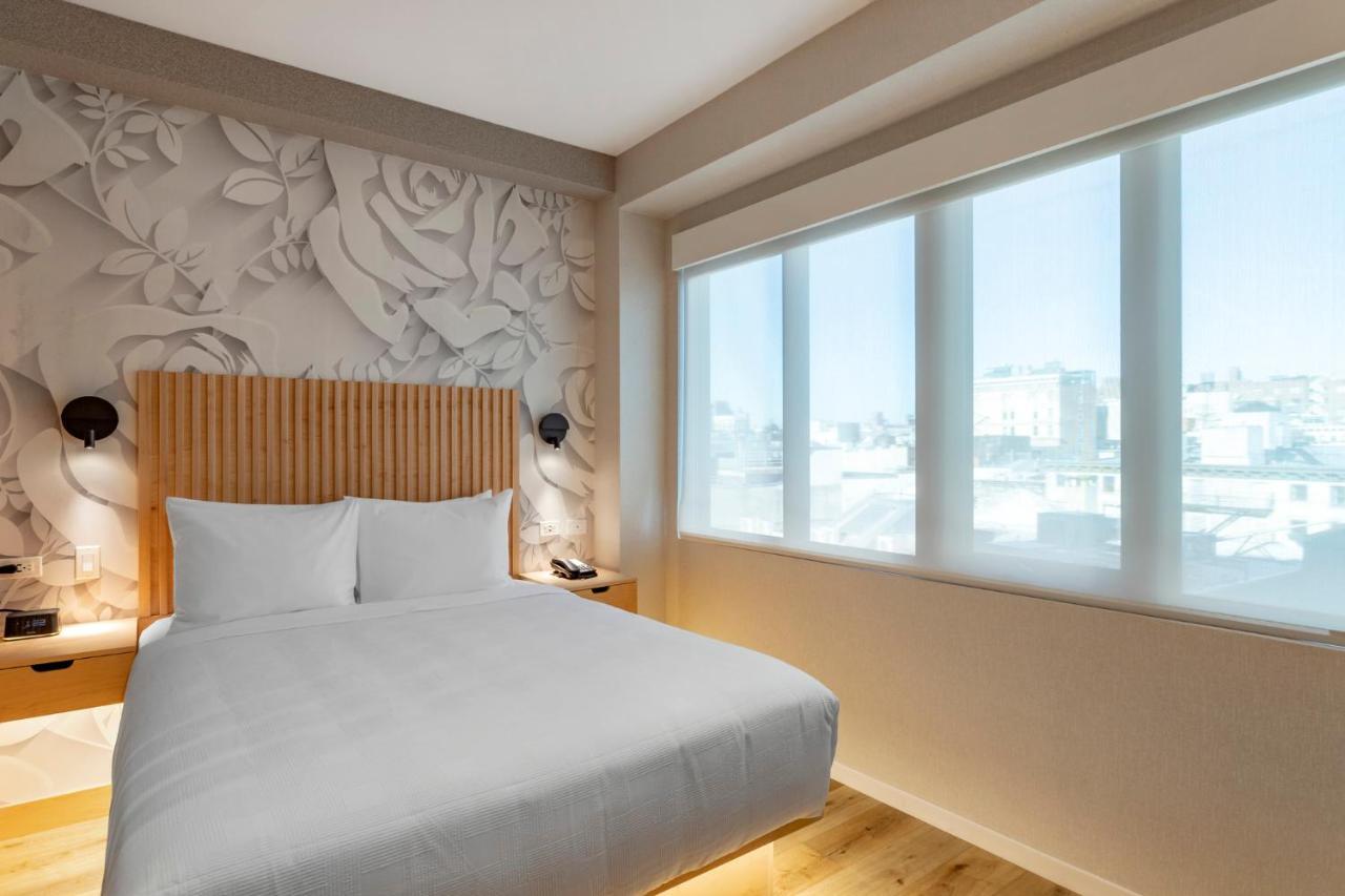 Kamer met Queensize Bed - Bad Geschikt voor Personen met een Lichamelijke Beperking