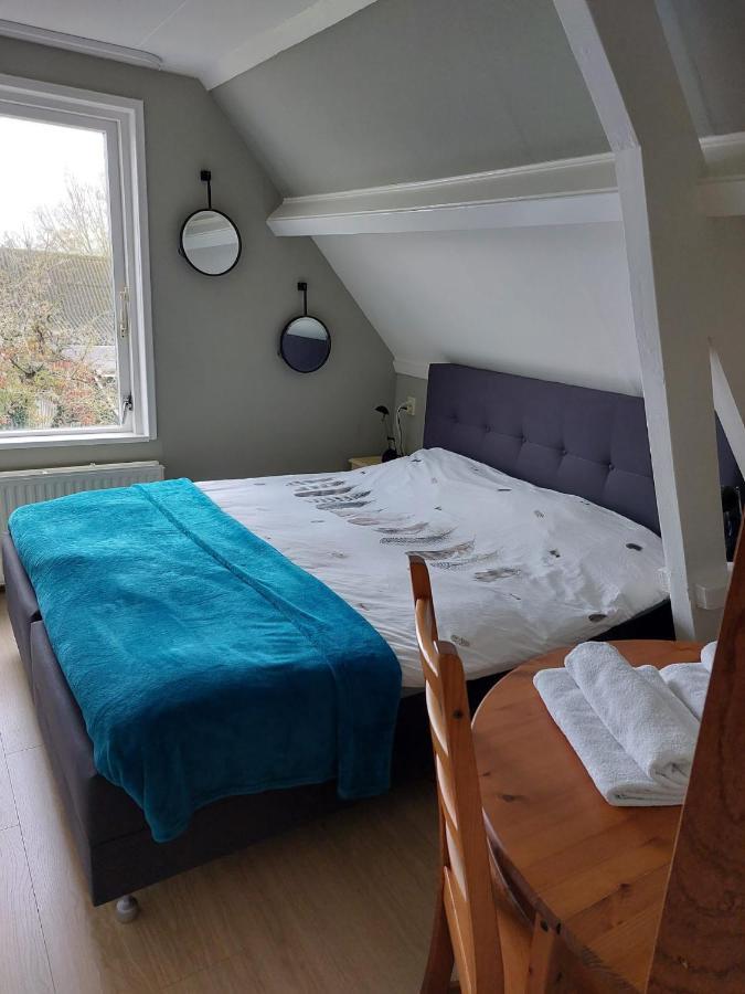 Tweepersoonskamer met 2 Aparte Bedden