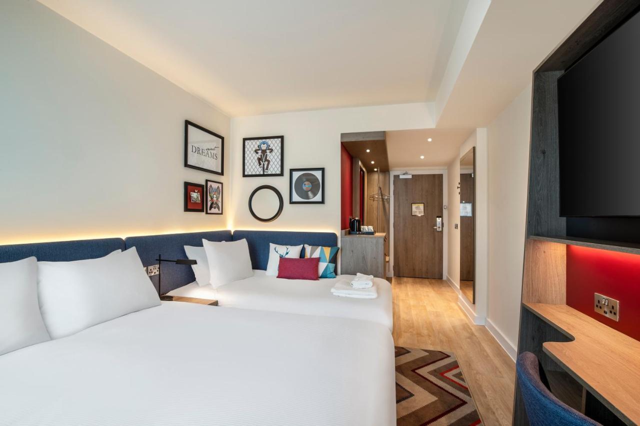 Kamer met Queensize Bed en Slaapbank