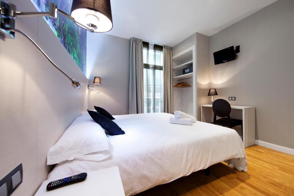 Tweepersoonskamer met 2 Aparte Bedden en een Extra Bed