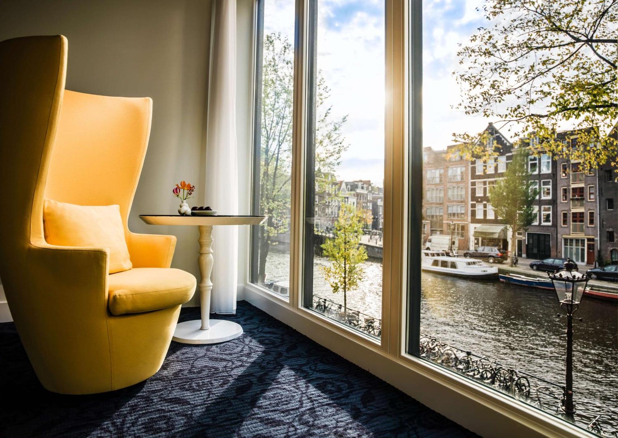 Kamer met een Queensize Bed en Uitzicht op de Gracht