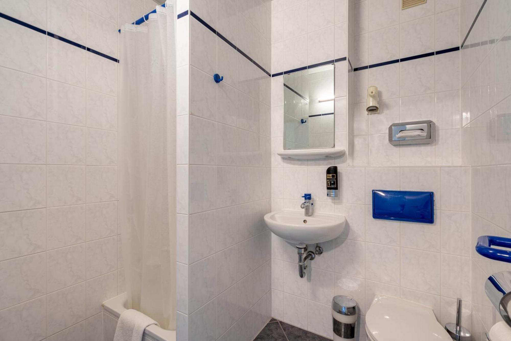 Bed in een Slaapzaal met 6 Bedden