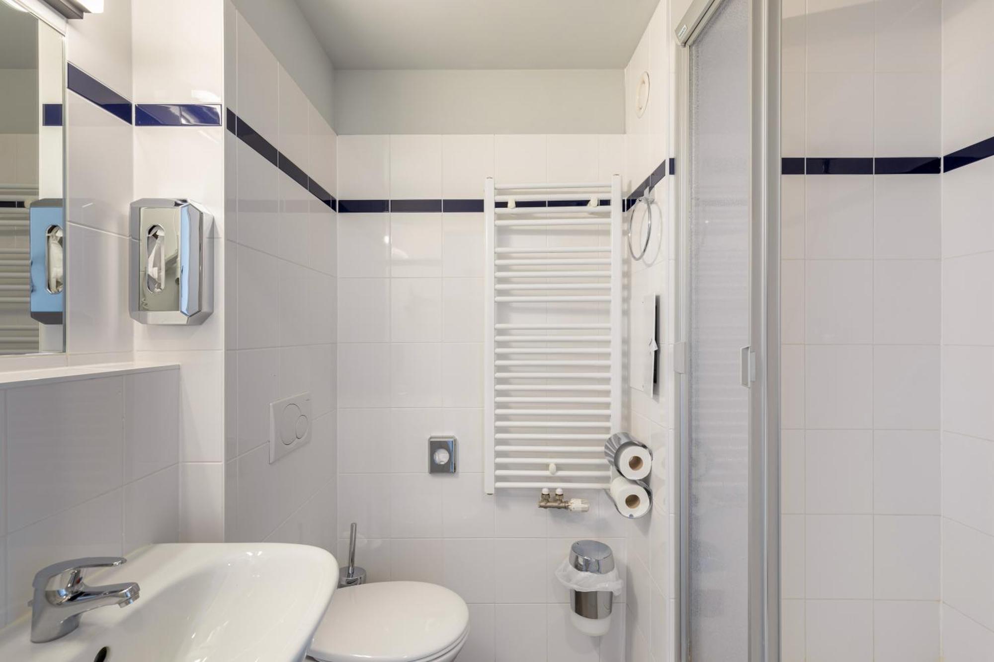 Kamer met twee aparte bedden voor eenpersoonsgebruik