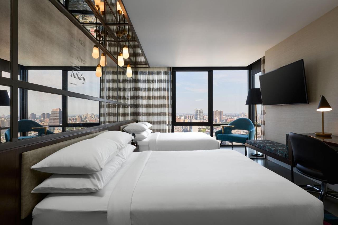 Kamer met 2 Queensize Bedden