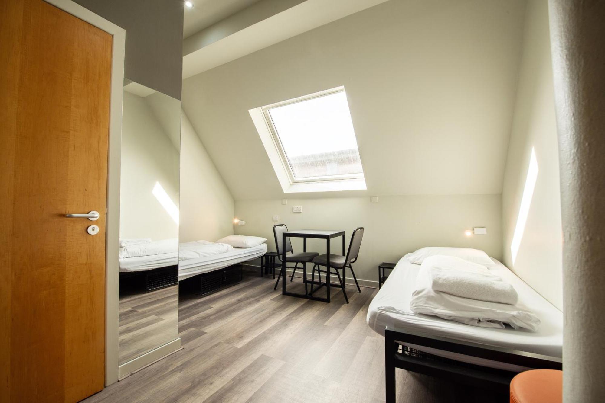 Bed in een Slaapzaal met 6 Bedden