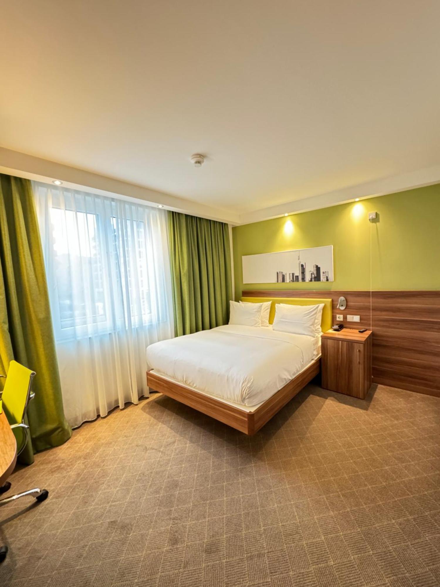 Kamer met Queensize Bed - Geschikt voor Gasten met een Lichamelijke Beperking