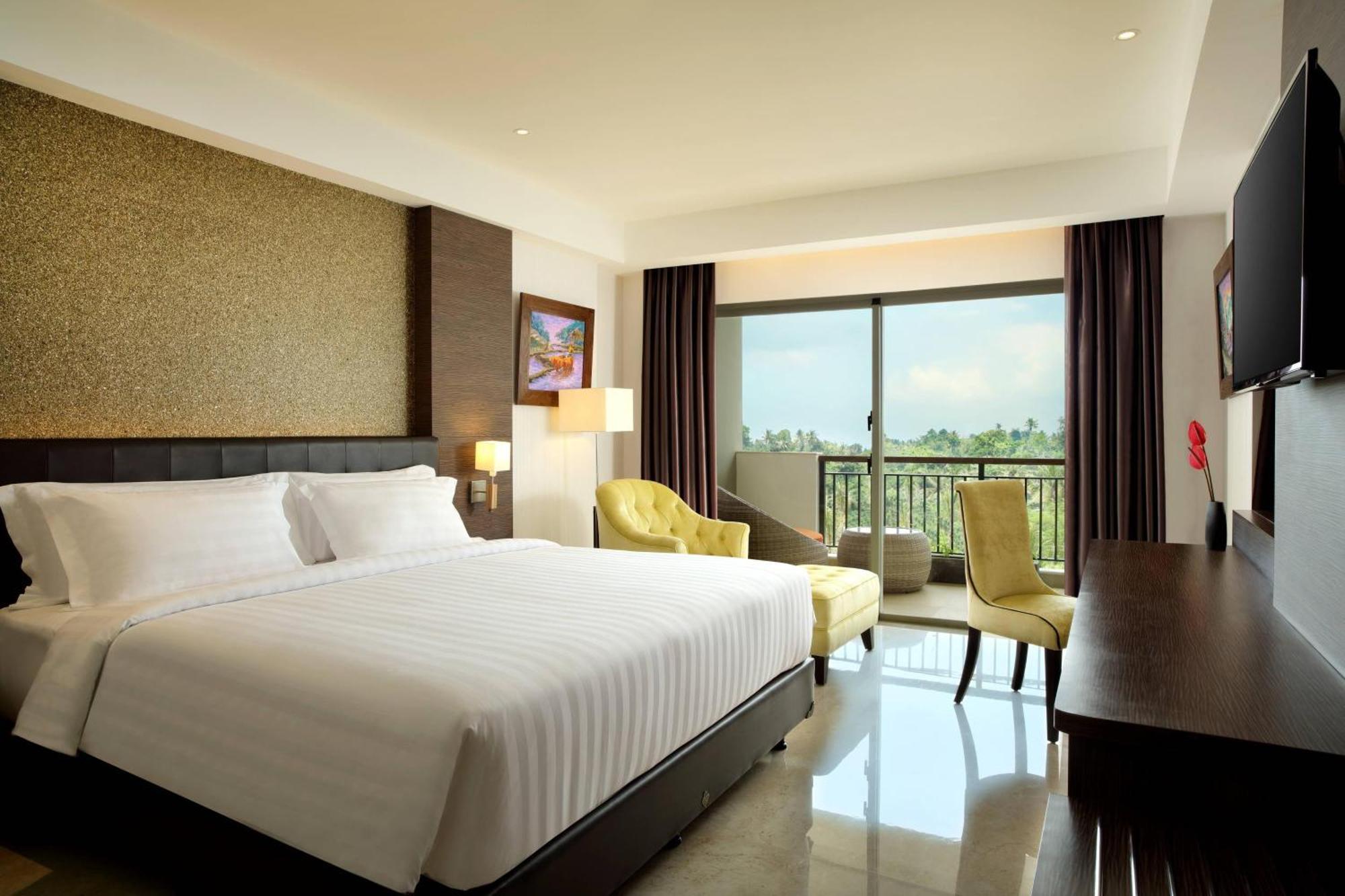 Deluxe King Balcony Room Pool View daily shuttle to Ubud City Photo Session Art Gallery Visit 24-hour access to Fitness Center Welcome Drink Kids Activities