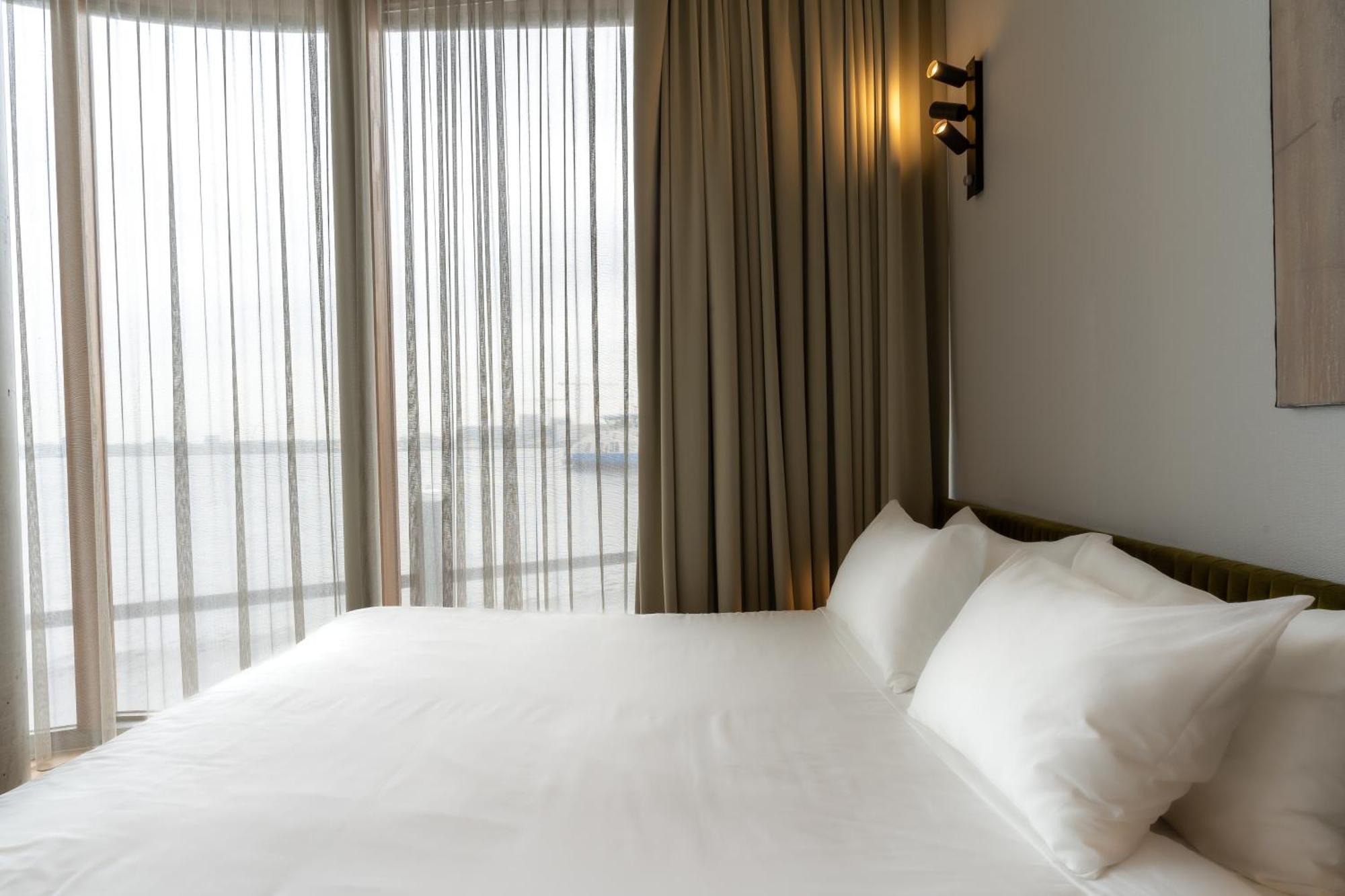 Junior Suite met 1 of 2 Bedden - Uitzicht op de Rivier