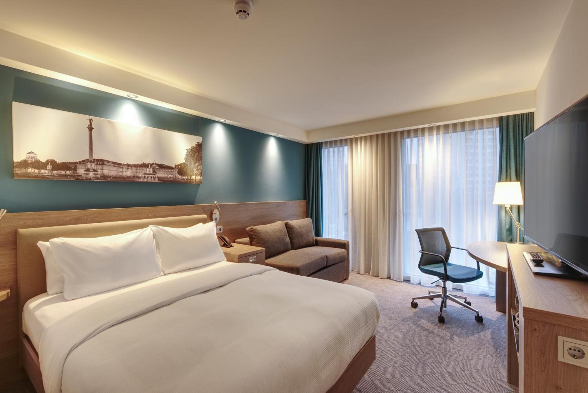 Kamer met Queensize Bed en Slaapbank