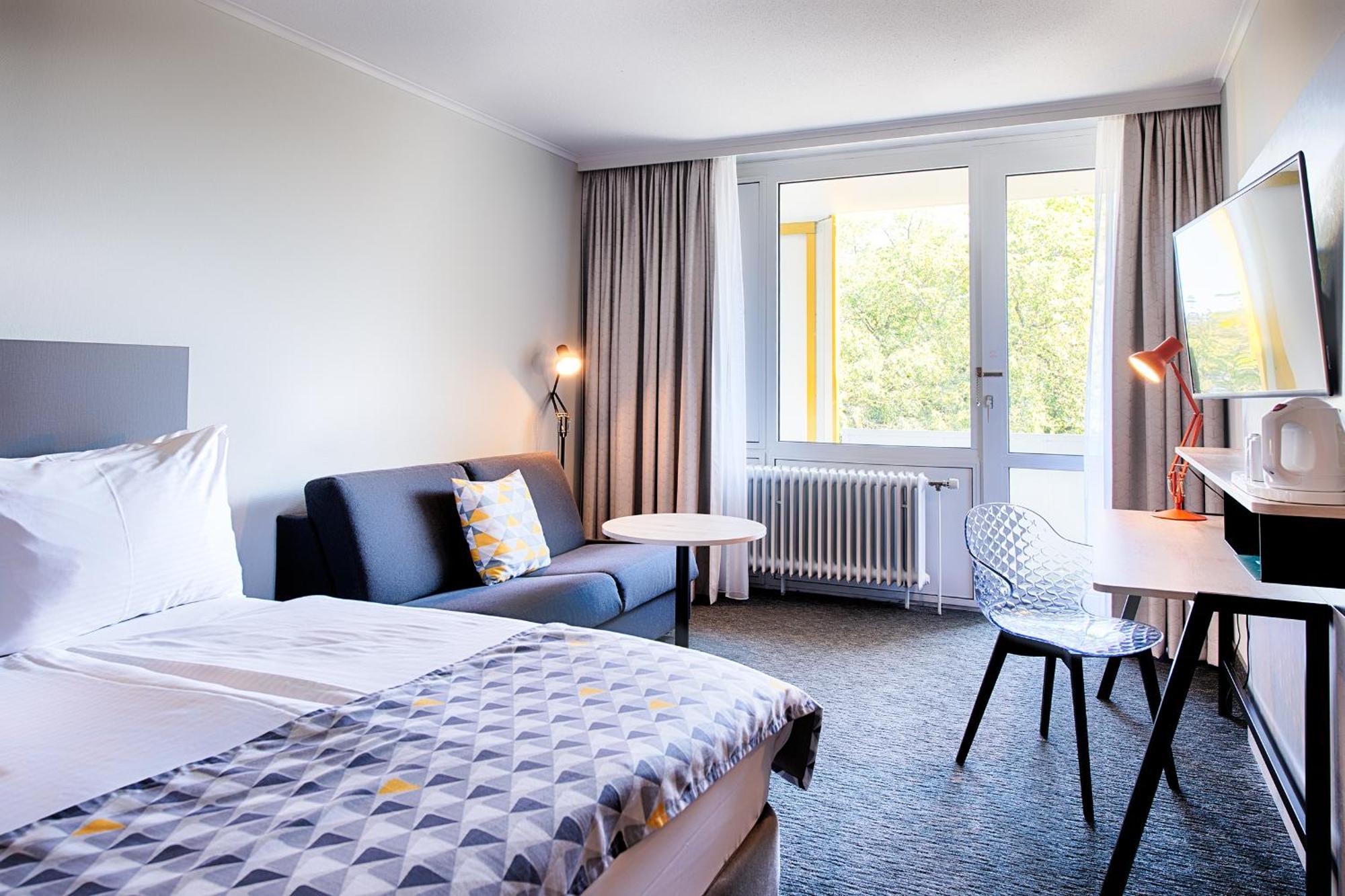 Standaard Kamer met Queensize Bed, Slaapbank en Balkon