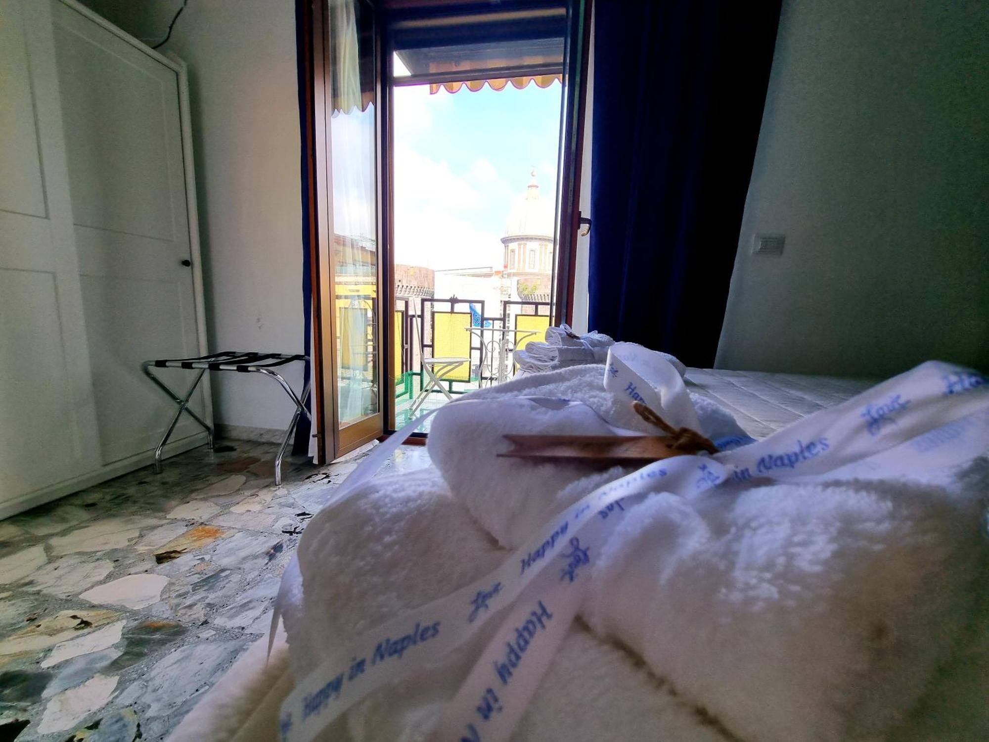 Kamer met Queensize Bed en Balkon