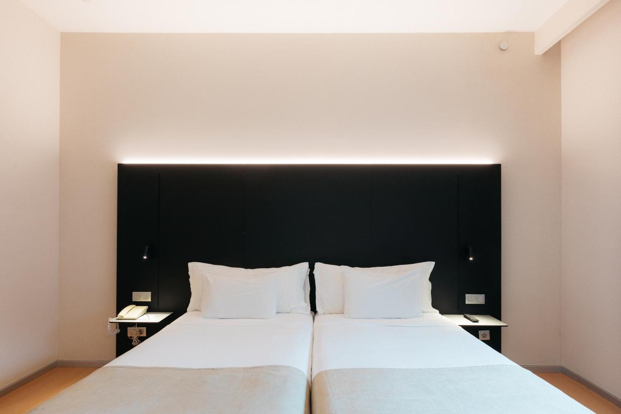 Tweepersoonskamer met 1 of 2 Bedden en een Extra Bed