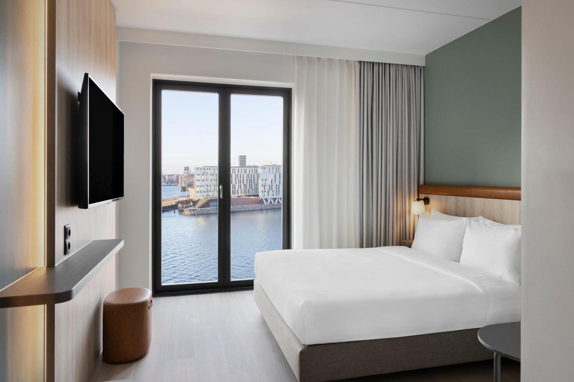 Kamer met Queensize Bed en Uitzicht op Zee