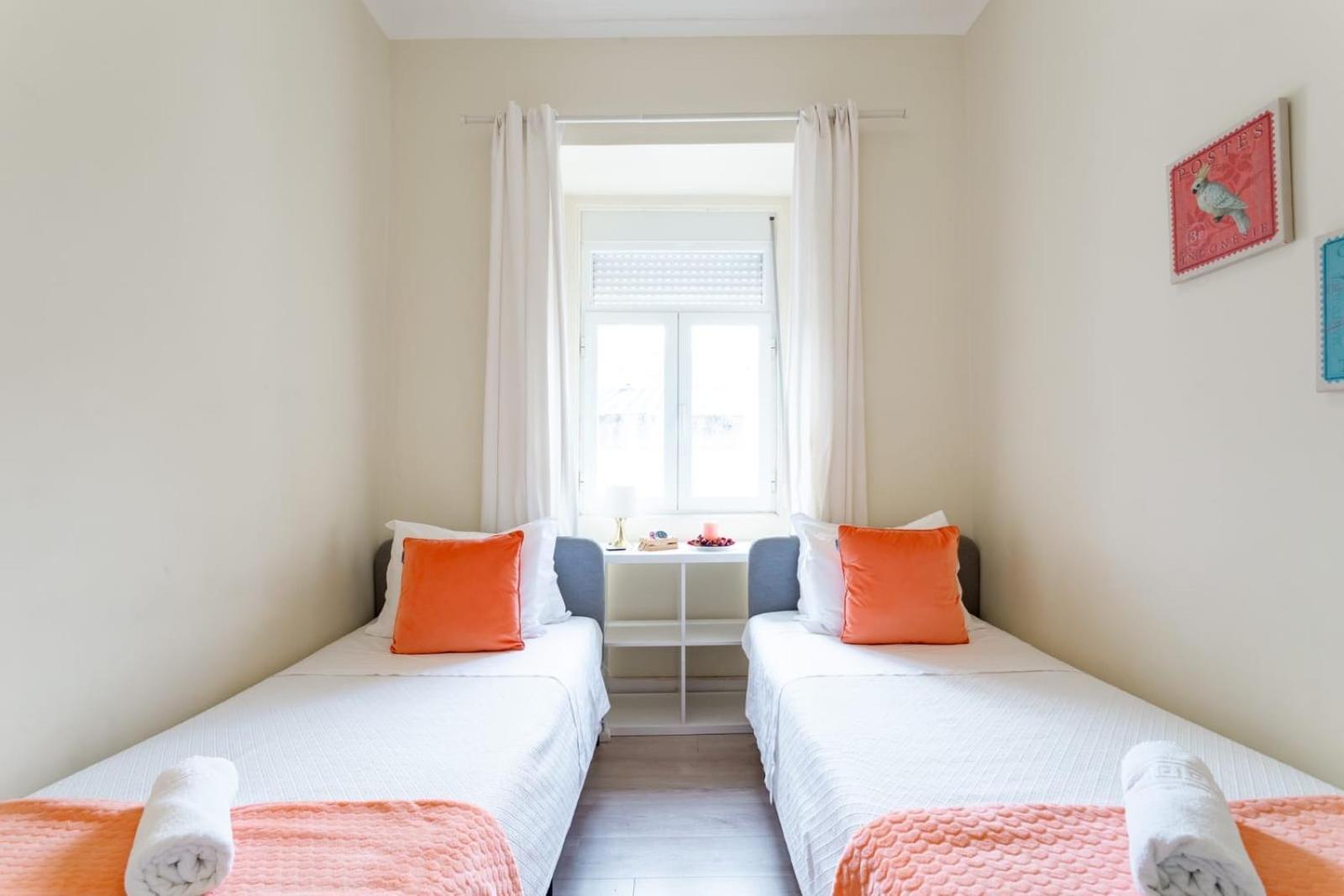 Tweepersoonskamer met 1 of 2 Bedden en Gedeelde Badkamer