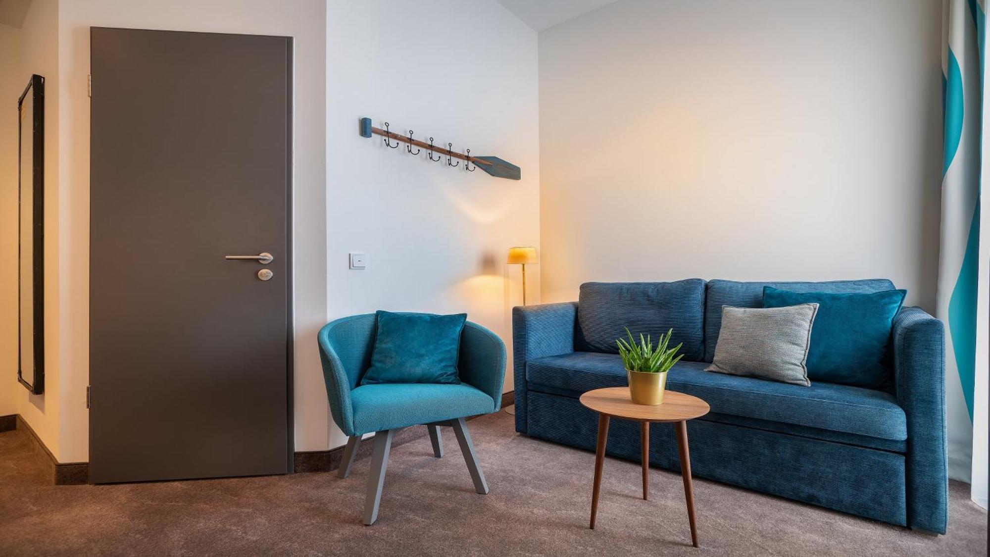 Premium Kamer met 1 Queensize Bed - Slaapbank