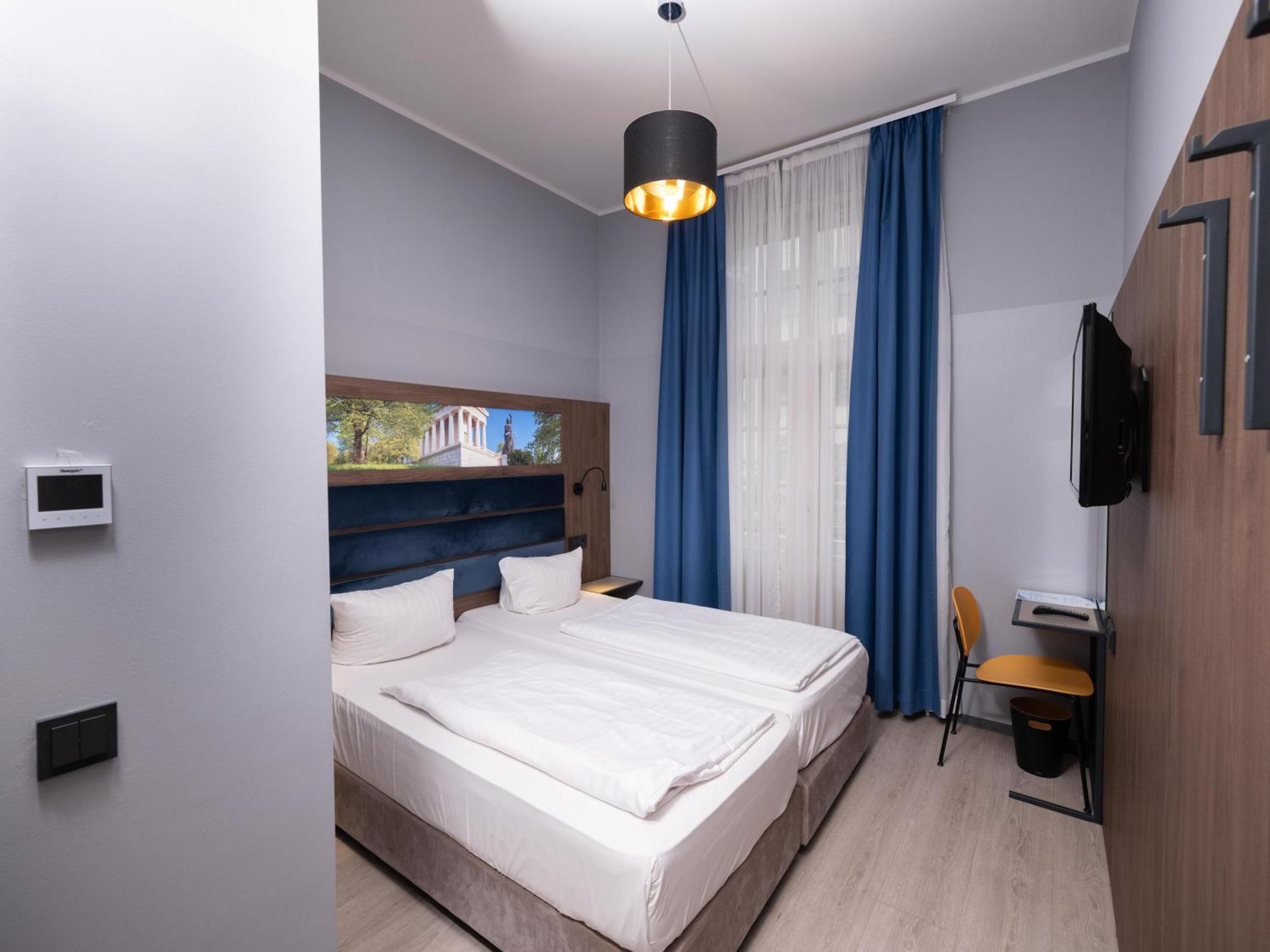 Tweepersoonskamer met 2 Aparte Bedden