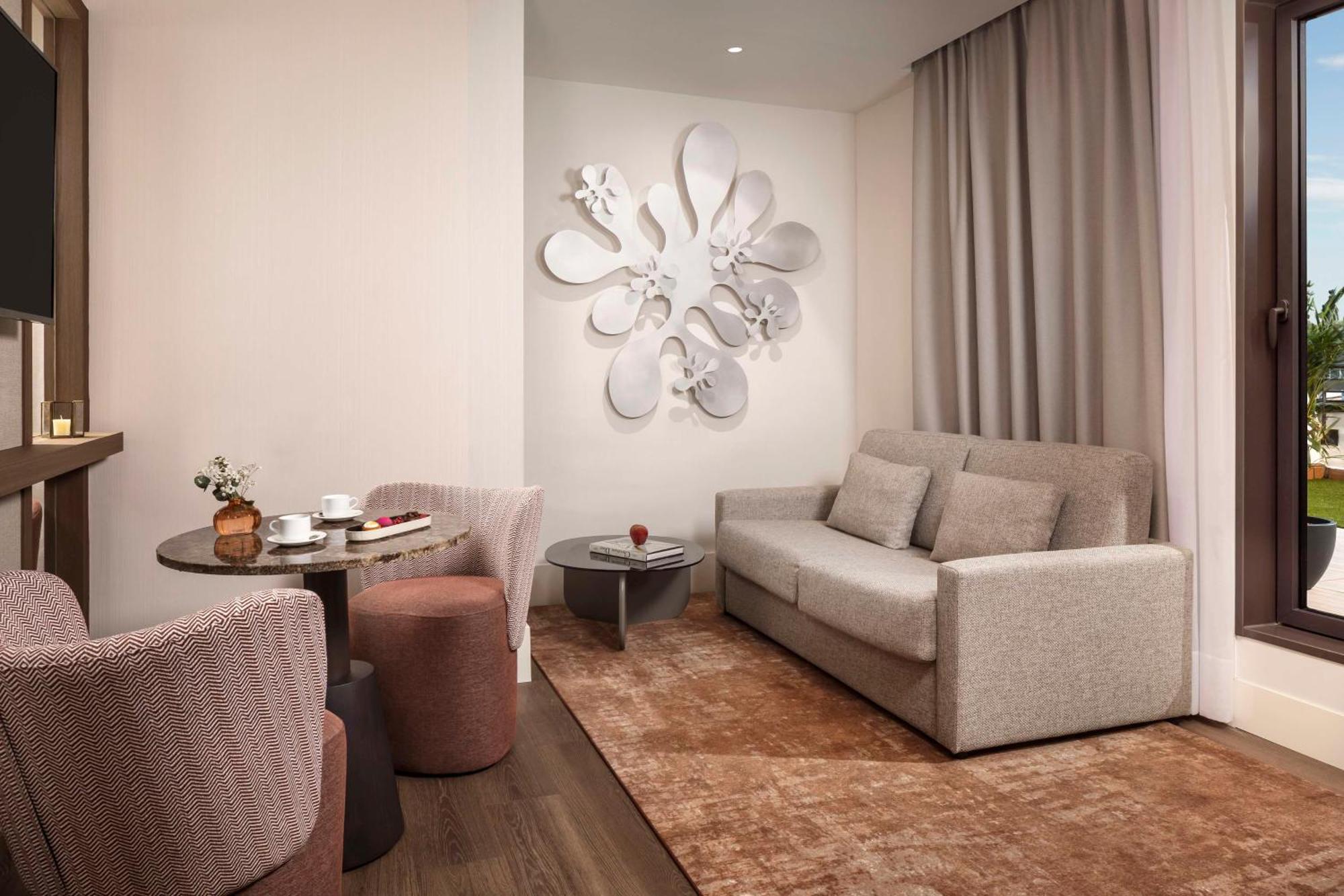 Suite met Terras en Extra Bed (2 Volwassenen + 2 Kinderen)