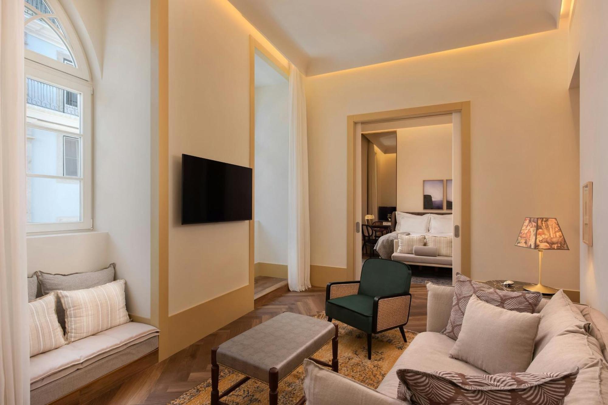 Suite met 1 Kingsize Bed, Slaapbank, Uitzicht op de Stad en Balkon