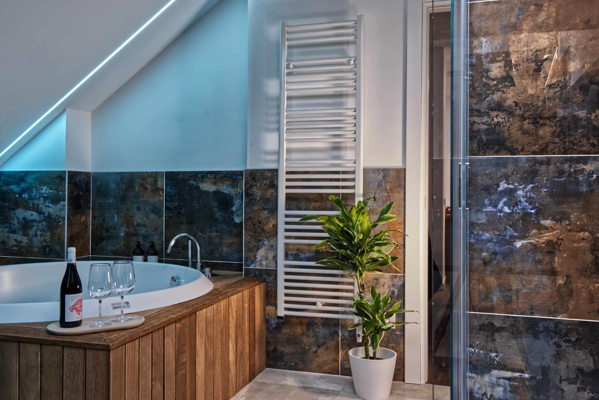 Suite met Queensize Bed en Bubbelbad