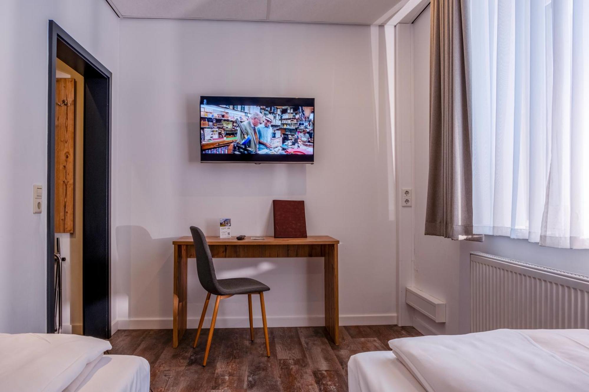 Tweepersoonskamer met 2 Aparte Bedden
