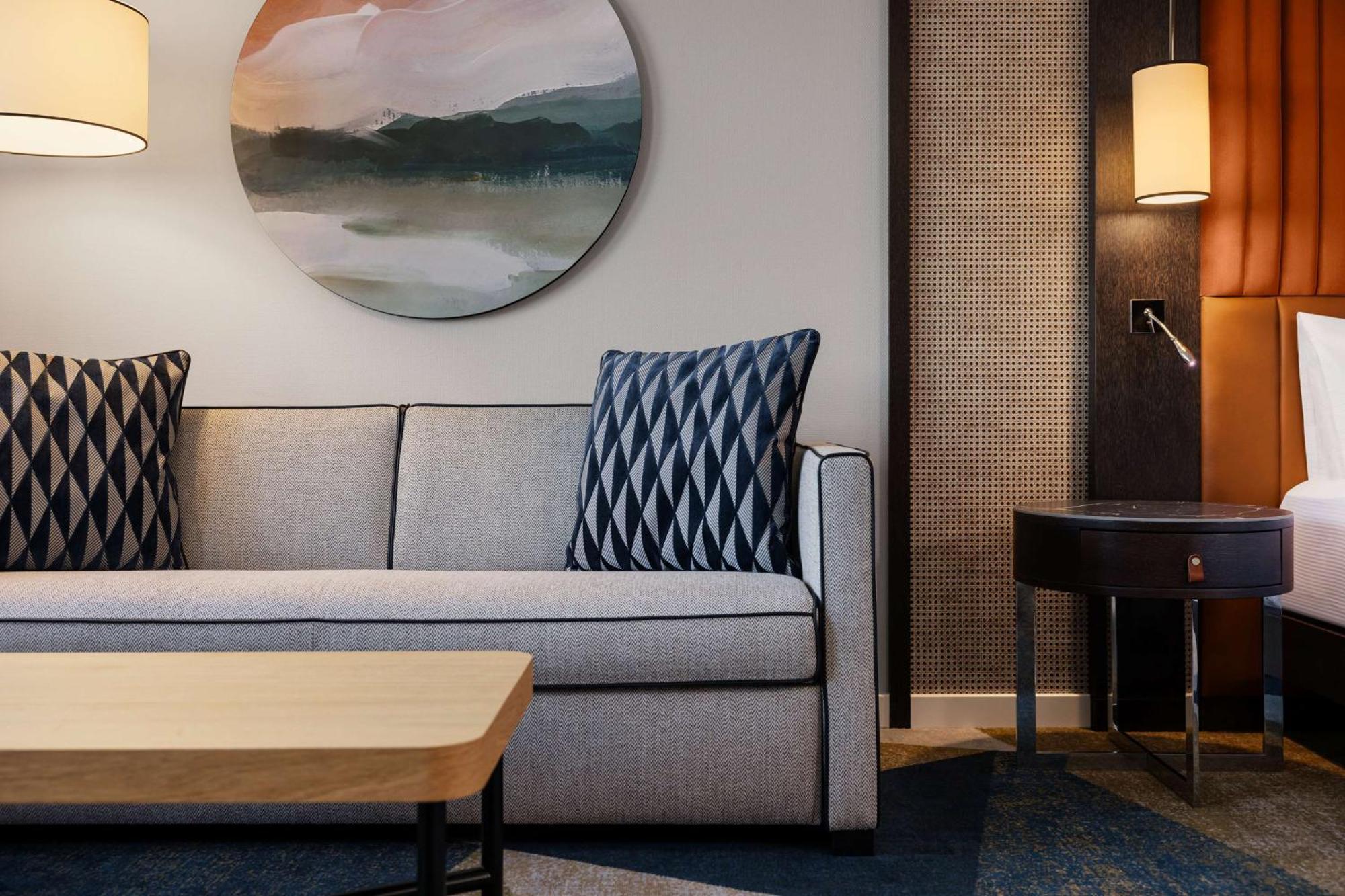 Executive Kamer aan het water met kingsize bed en slaapbank