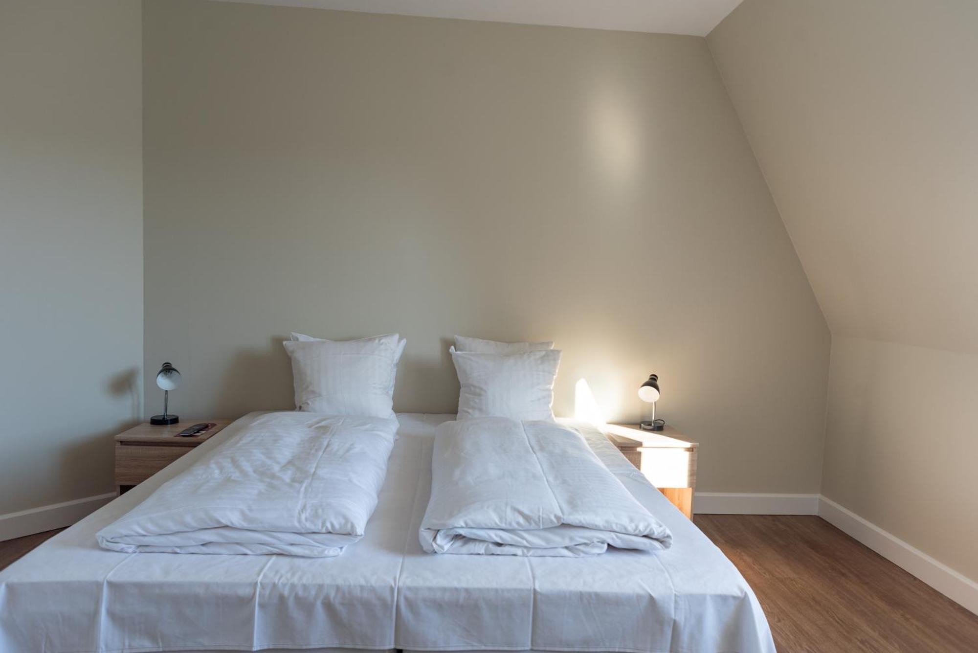 Luxe Kamer met 1 of 2 Bedden en Balkon