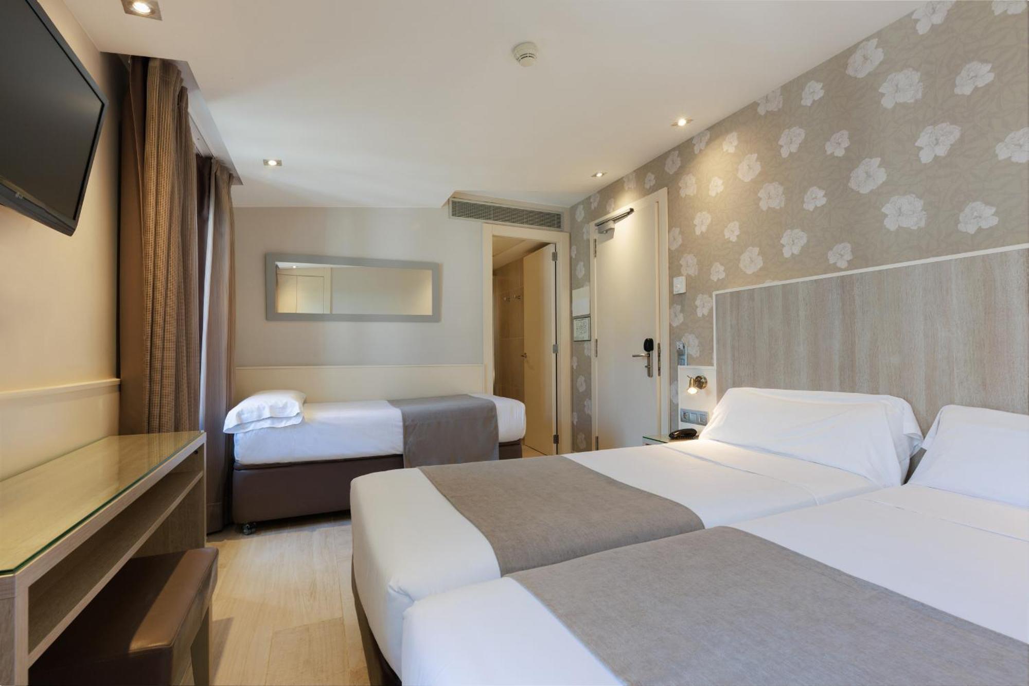 Tweepersoonskamer met 1 of 2 Bedden en een Extra Bed
