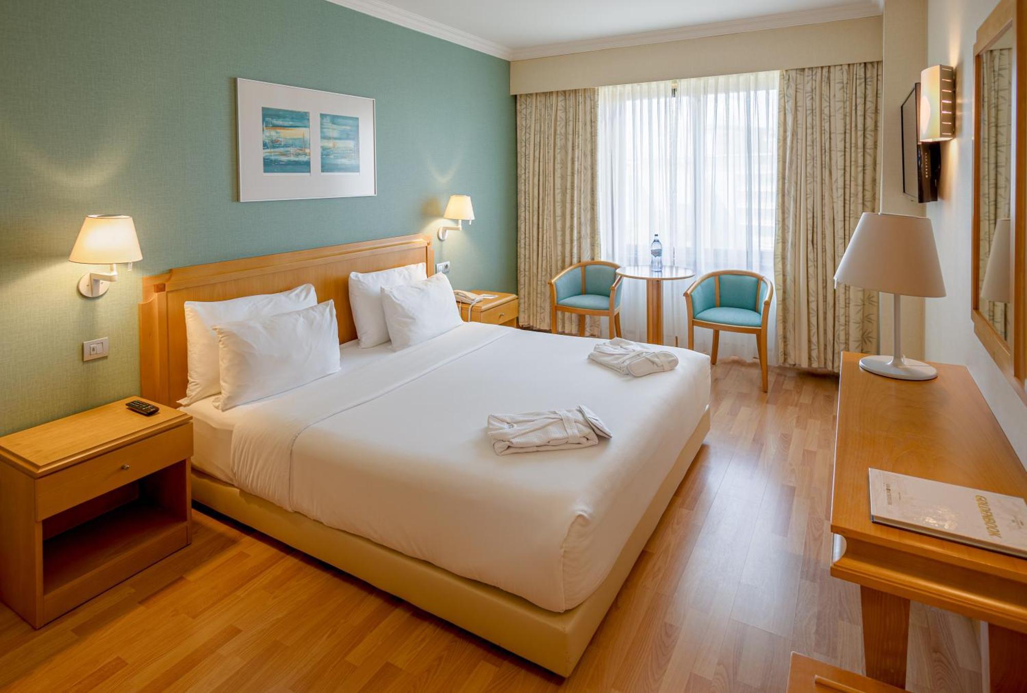 Tweepersoonskamer met 1 of 2 Bedden en een Extra Bed