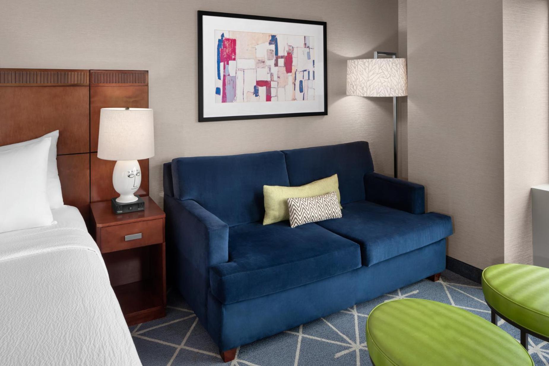 Kamer met Kingsize Bed en Uitzicht op de Stad