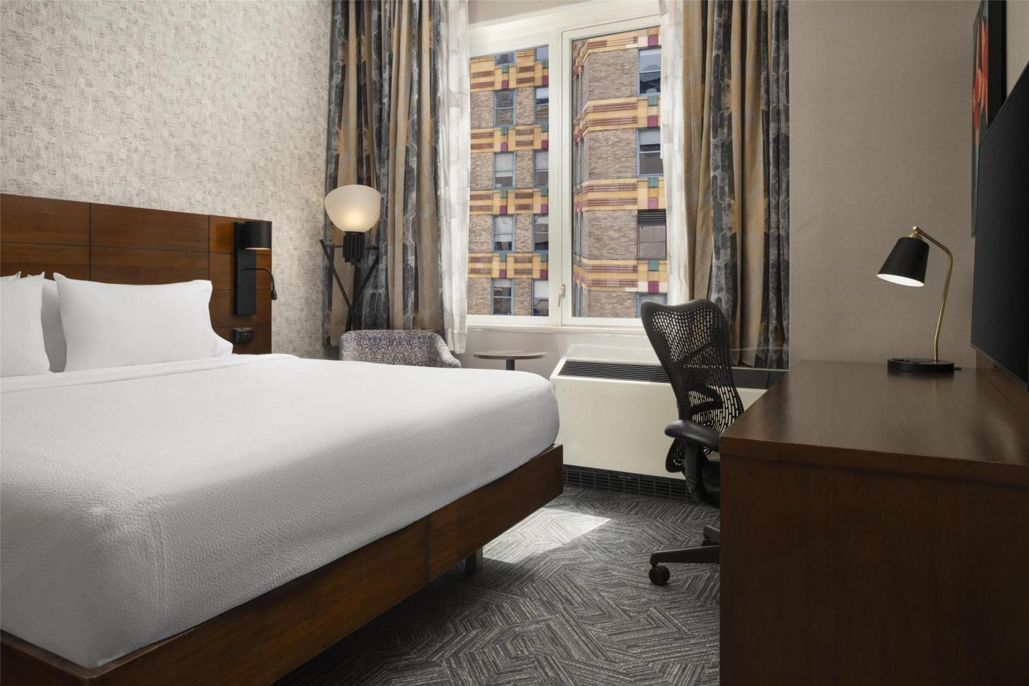 Kamer met Kingsize Bed en Badkuip Geschikt voor Gasten met een Lichamelijke Beperking