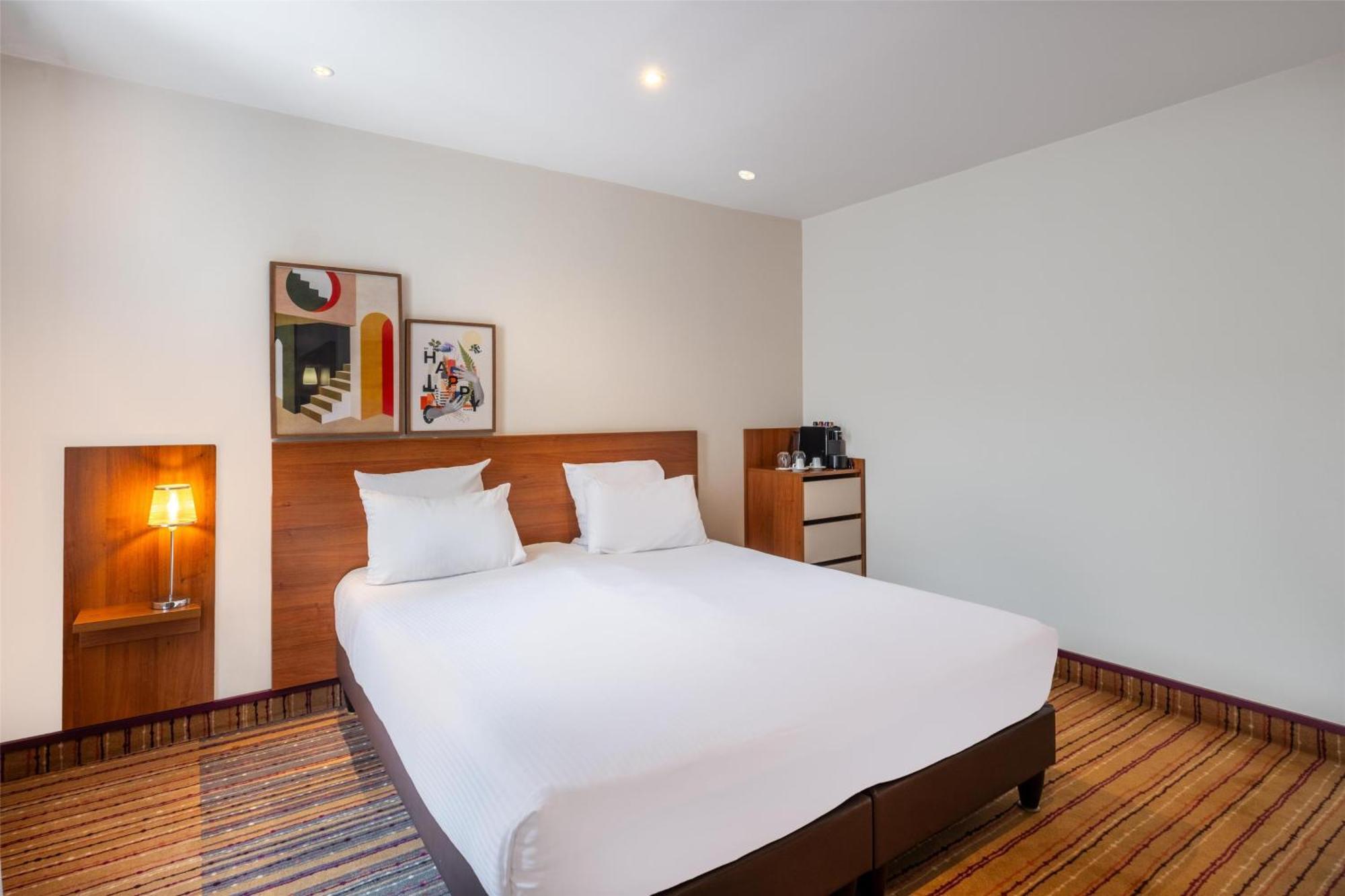 Kamer met Kingsize Bed en Slaapbank