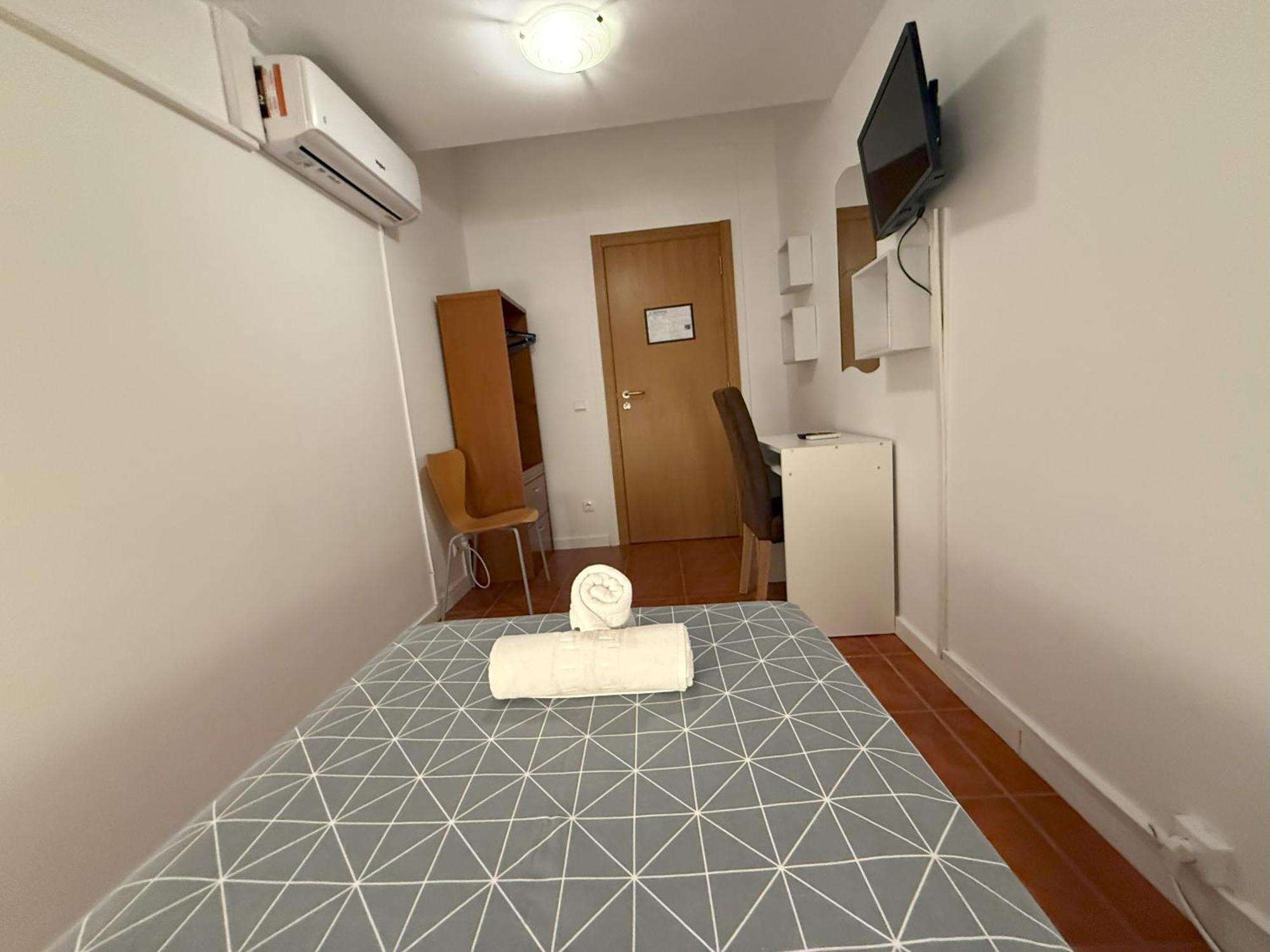 Eenpersoonskamer met Gedeelde Badkamer
