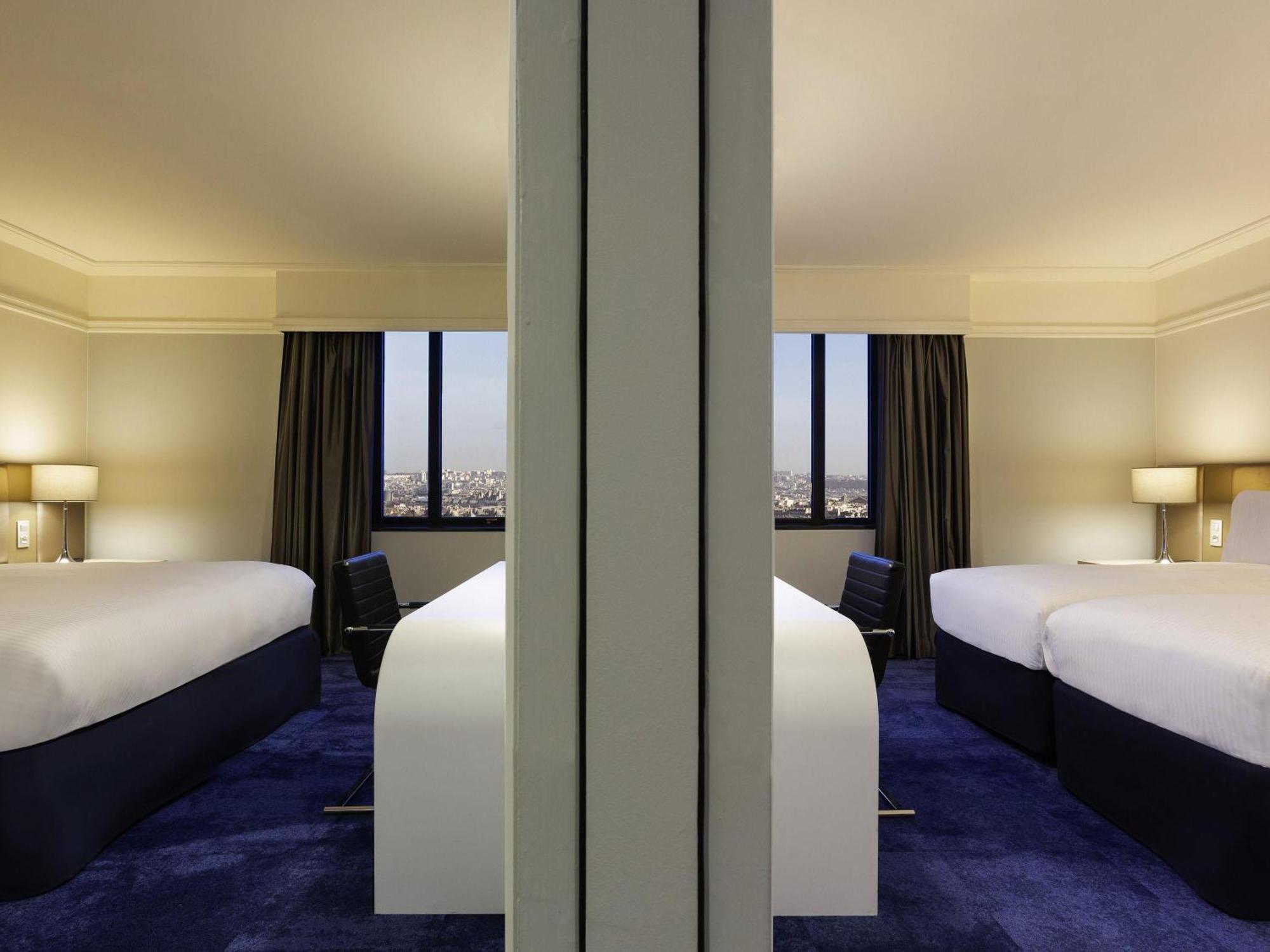 Klassieke Familiekamer met een Queensize Bed en 2 Slaapbanken.