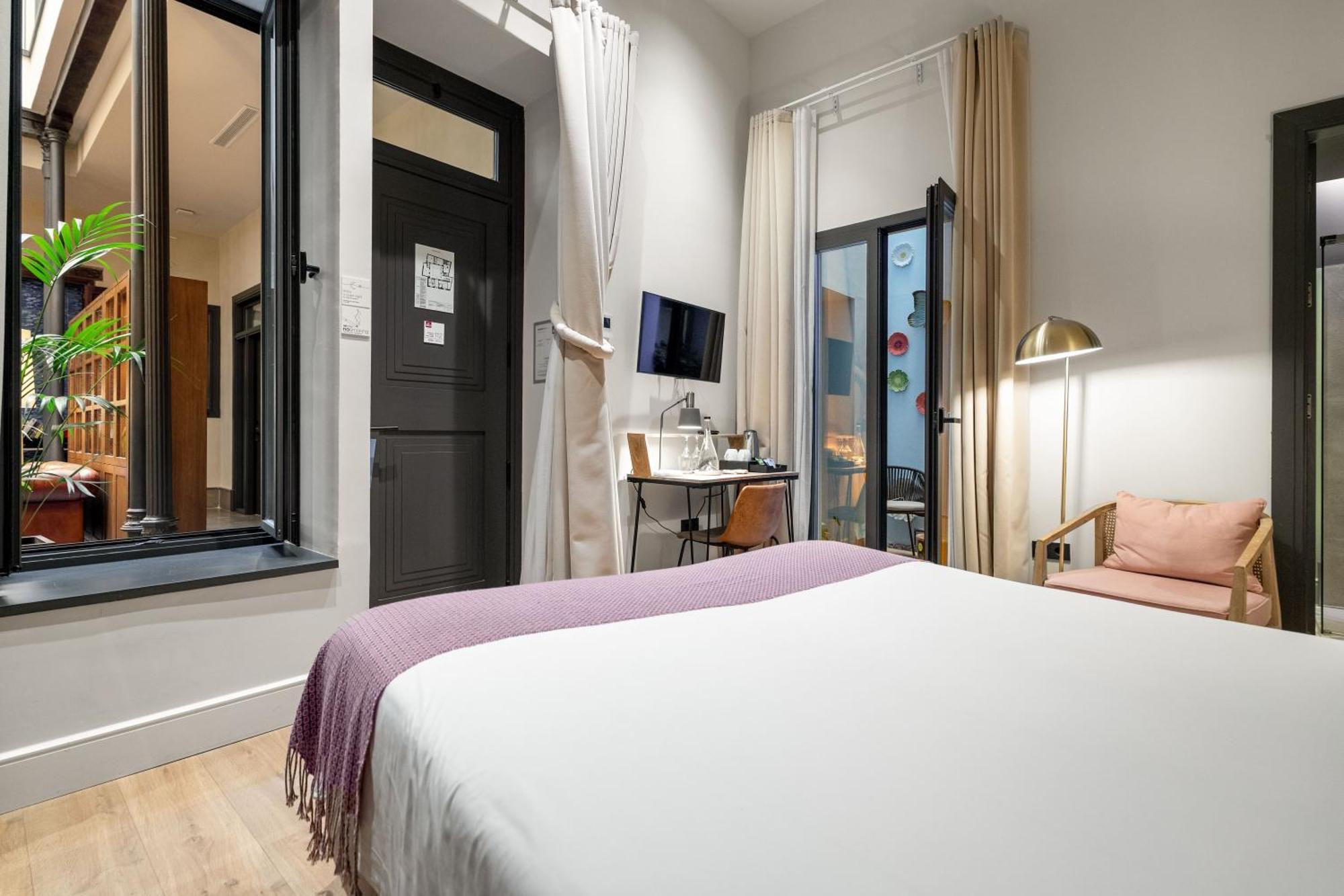 Tweepersoonskamer met 1 of 2 Bedden - Uitzicht op de Binnenplaats