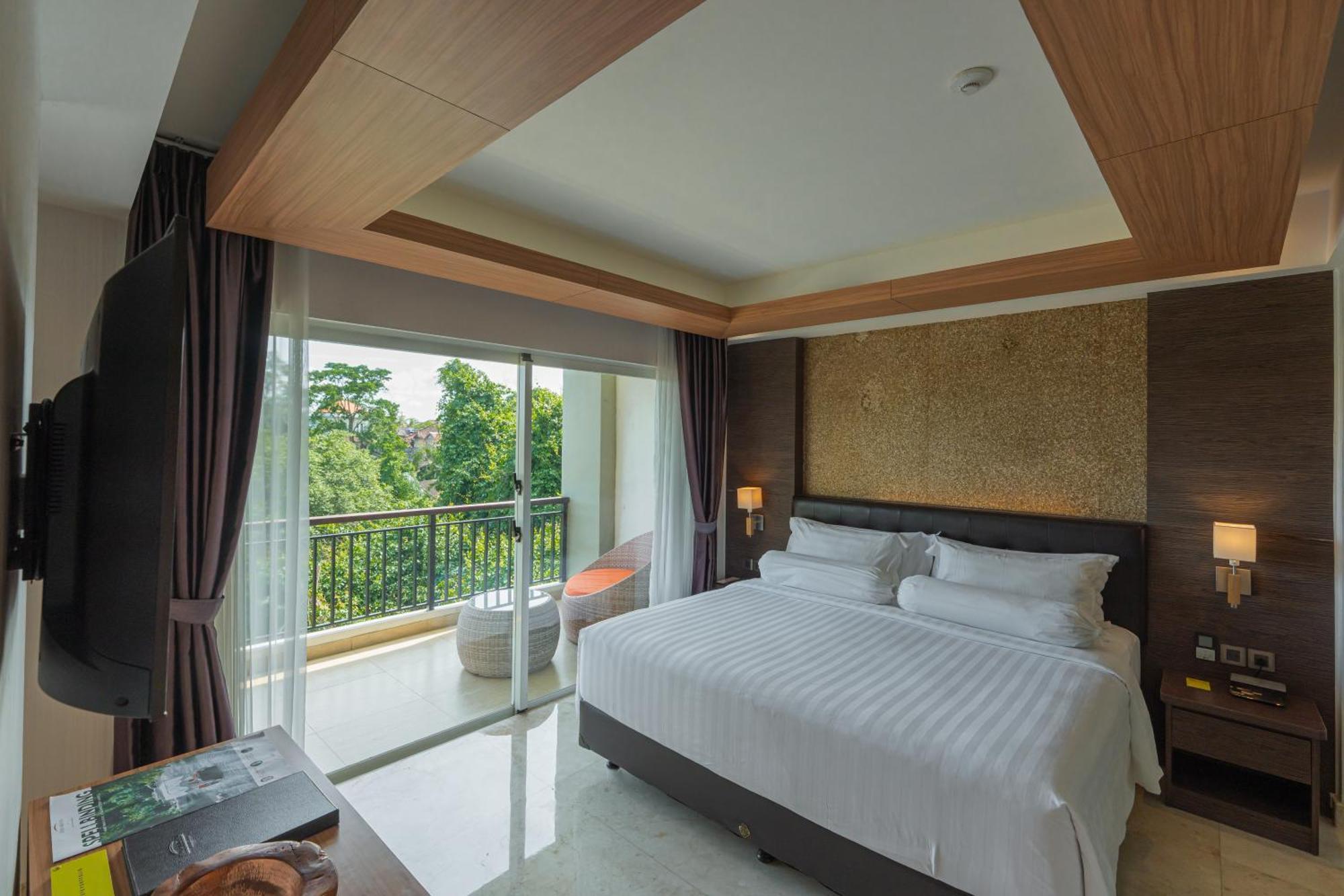 Jungle Suite Room Balcony River View daily shuttle to Ubud City Photo Session Art Gallery Visit 24-hour access to Fitness Center Welcome Drink Kids Activities