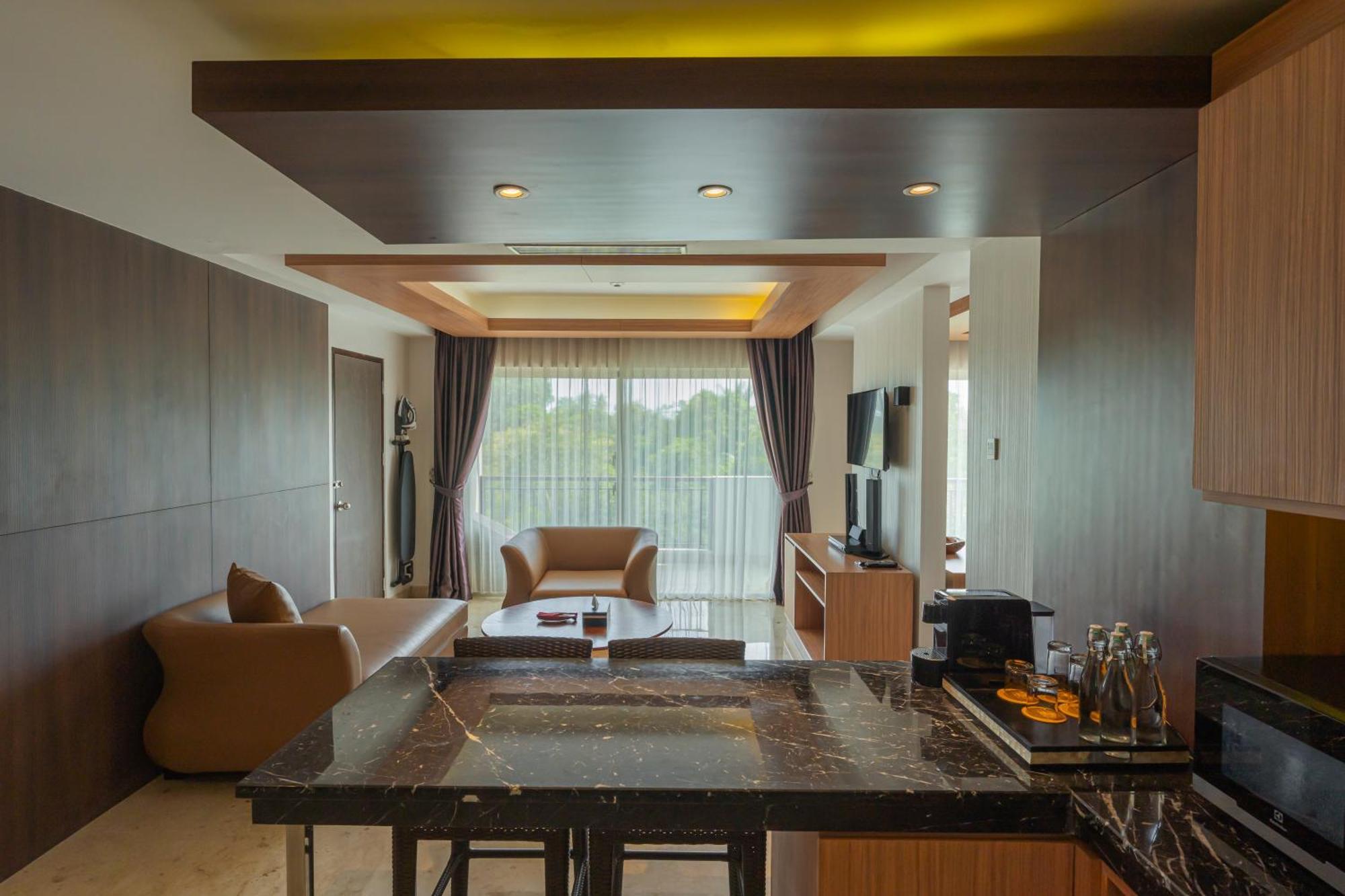 Jungle Suite Room Balcony River View daily shuttle to Ubud City Photo Session Art Gallery Visit 24-hour access to Fitness Center Welcome Drink Kids Activities