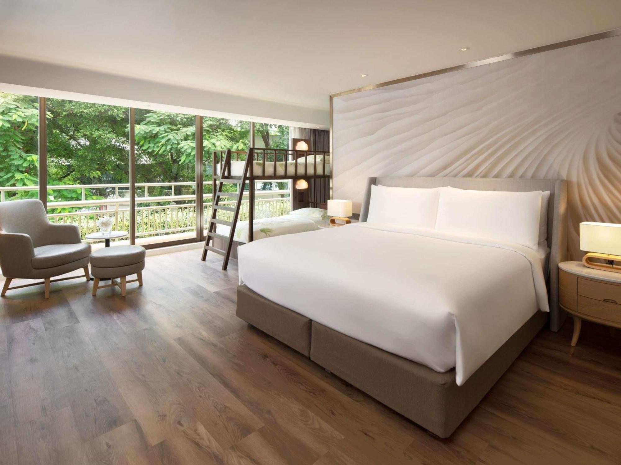 One-Bedroom Family Suite Twin Beds Sofa Bed